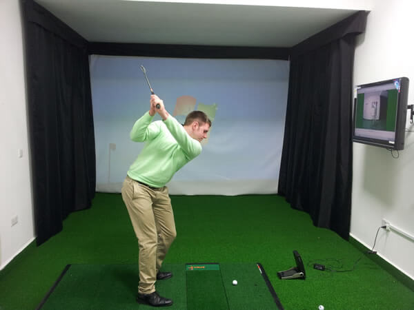 Golfer in the academy room